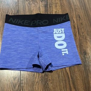 purple nike pros.